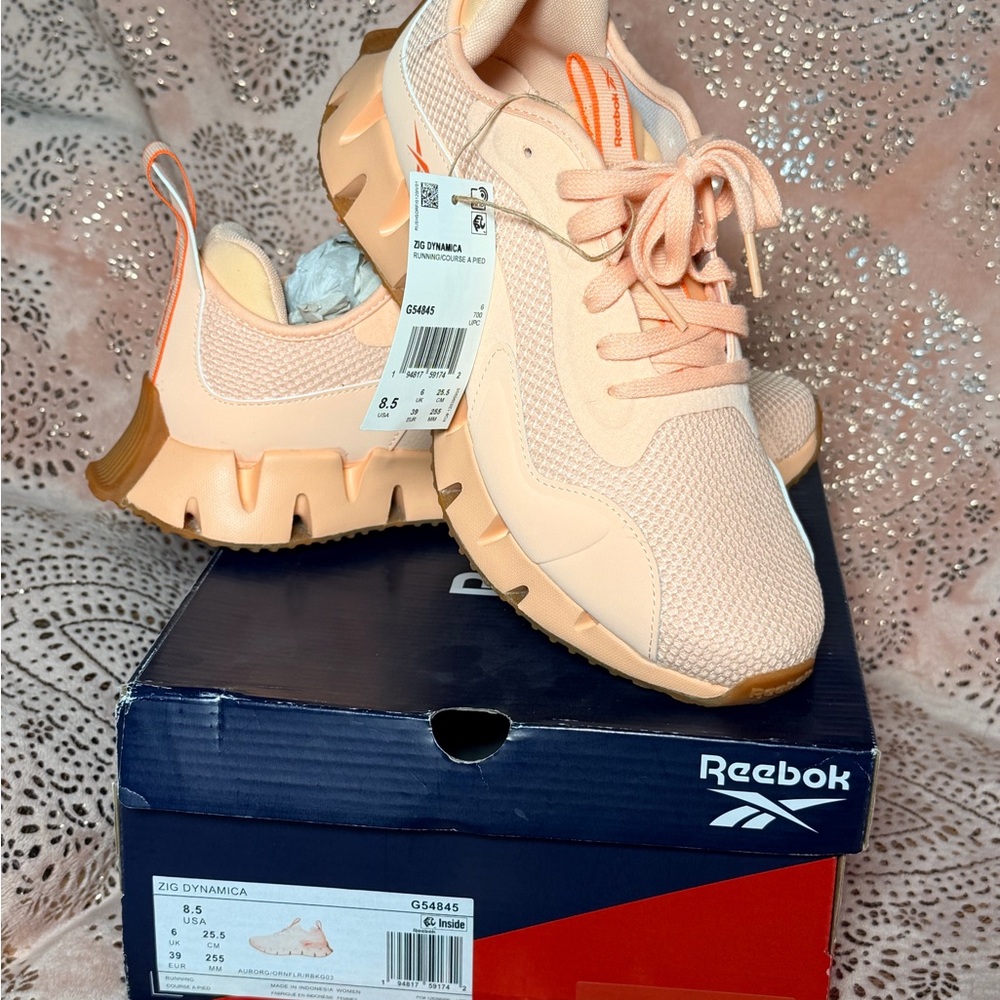Reebok Women's Light Orange / Coral Sneakers